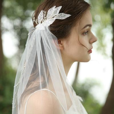 China Simple New Design Gauze Shiny Leaf Bead Wedding White Dense Bridal Veils for sale