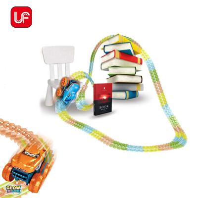 China Light Up Slot Toy Best Christmas Gift Big Size Orbit Track 150Pcs Track Toys Dinosaur Battery Track Car for sale