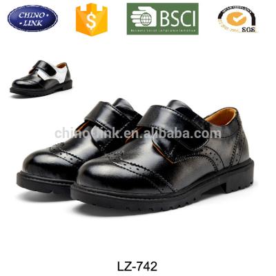 China Leather Material Buckle Strap PU Girls And Boys Kids Black School Dress Performance Shoes for sale