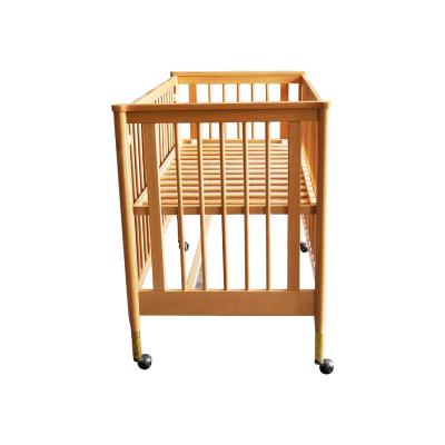 China Traditional Quality First Bed Design Wooden Furniture Crib With Wheel for sale