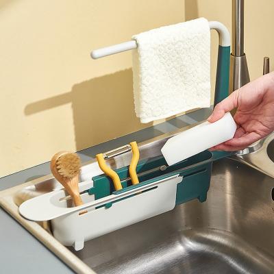 China Tools Household Sink Shelf Kitchen Self Draining Soap Sponge Basket Rack Telescopic Storage Holder Rack Cloth Towel Rack for sale