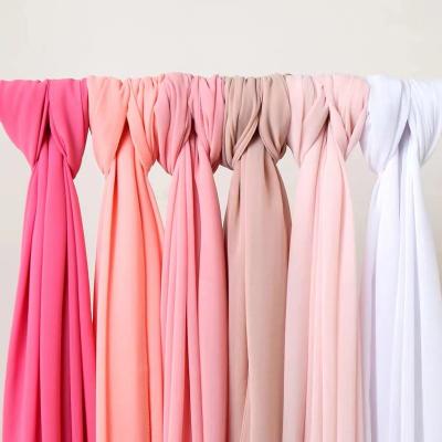 China Wrinkle Resistant Georgette Chiffon Fabric Factory Price 100% Polyester 75D High Twist Georgette Moss Crepe Pearl Chiffon Fabric For Dress for sale