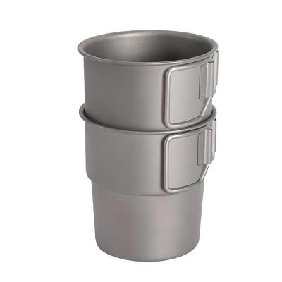 China Lightweight Portable Surface Sanding Treatment Titanium Drinking Cup Camping Coffee Cup With Folding Handle for sale