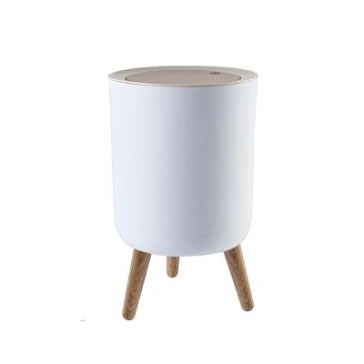 China Sustainable Creative Household Press Type Wood Grain Tall Trash Can With Lid For Living Room for sale