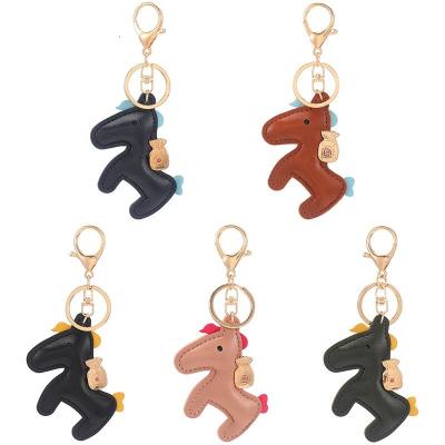 China Car Exquisite Leather Pendant Metal Gift Key Chain Accessories Pony Keychain Wholesale Charm Bag for sale