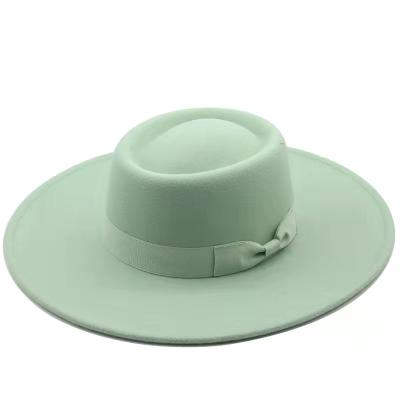 China Easy To Install And Remove Aotemao Big Brim Jazz Women Polyester Cotton Vegan Fedora Hats Material for sale