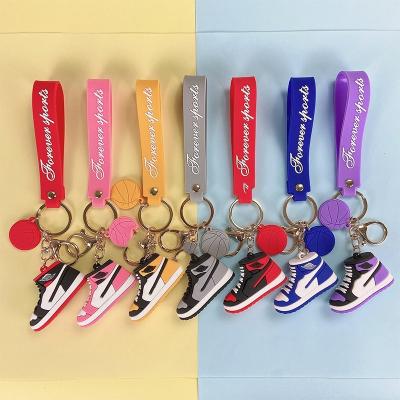 China Easy to Install and Remove 3D Mini Sneakers Basketball Keychain Wholesale Phone Case Key Chain with Wrist Strap for sale