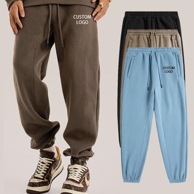 China Drawstring Trackpants Men's Custom Breathable Winter Joggers Cargo Pants Manufacturer Sports Plus Size Loose Fleece Cotton Sweatpants Men for sale