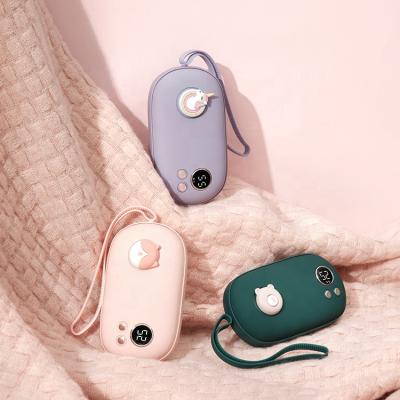 China Winter Lovely Mini Size S21 Rechargeable Feet Warmer Portable Fast Portable 5000mah Battery Hand Warmer for sale