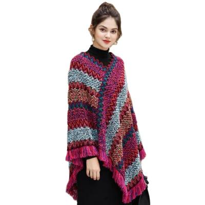 China 2021 newest fashion cashmere women's poncho shawl cap ethnic winter new protecting ponchos fringed knitted scarf for women for sale