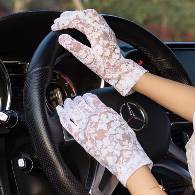 China Breathe Free Hot Sale Stock Popular Sunscreen Label Leading Wrist Party Gloves Wedding Lace Bridal Gloves For Women for sale