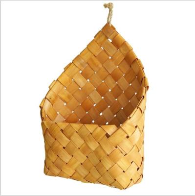 China Bamboo Woven Decorative Senator Dry Dessert Table Basket Storage Basket China Triangle Wall Flower Basket Frame Props for sale