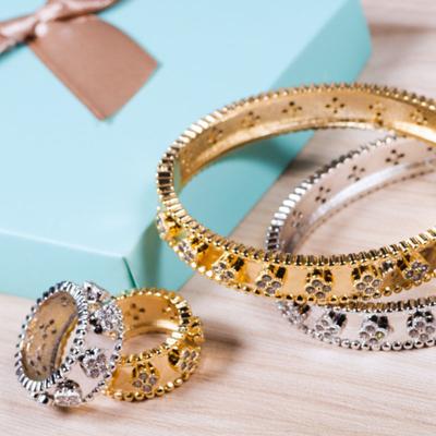 China Four Petal Bangle Design Noble Flower Diamond Bracelet Vintage Classic Gold Plated Zircon Ring Luxury Gemstone Jewelry Set for sale