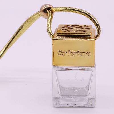 China Customized Golden Golden Wooden Perfume Bottle Cap Hanging In Car for sale