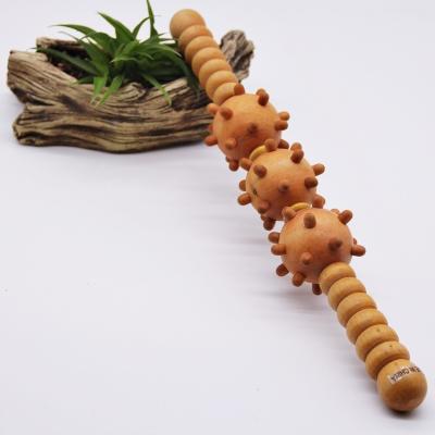 China Cellulite Portable 3 Balls Muscle Roller Stick Wooden Massage Roller Stick for sale