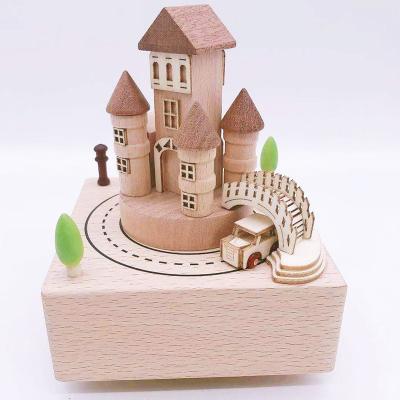 China Portable Festival Gift Animated Wooden Car Music Box With Castle for sale