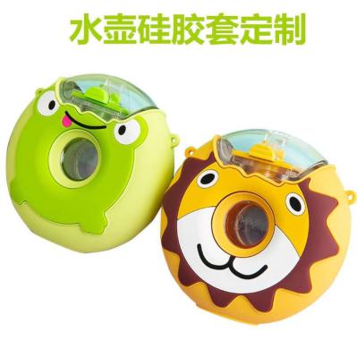 China New Cartoon Silicone Creative Cute Viable Portable Donut Drinking Water Bottle With Straw Student Water Bottles for sale