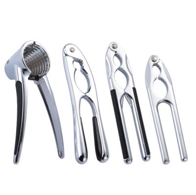 China Assembly 2021 Zinc Alloy Stainless Steel Food Nut Clamps Core Nut Clamps Peeling And Holding Hickory Tools for sale