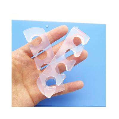 China Toe Separators Flexible Soft Silicone Toe Finger Separator Toe Spacers for Nail Polish Pedicure Tools for sale