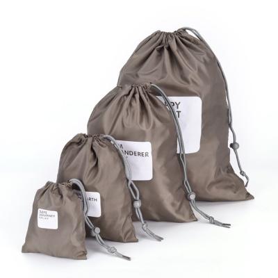 China Lightweight.Space-saving.Reusable Lightweight.Space-saving.Reusable 4pcs/lot Set Travel Storage Bag Waterproof Nylon Drawstring Pouch Men And Women Folding Clothes Organizers Classified for sale