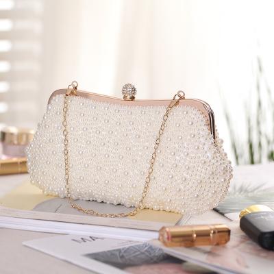 China Latest Design High Quality Shell Evening Handbag Bags Clutches Pearl Evening Clutches For Woman for sale