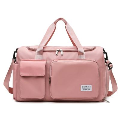 China Designer Custom Traveling Duffle Lady Bags Waterproof Duffle Gym Sports Luggage Travel Organizer Bag for sale