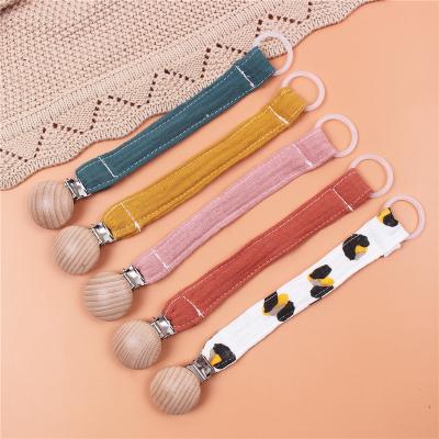 China BPA Free Cotton Baby Pacifier Chains Beech Wood Dummy Cups Teething Toys Infant Holder For Kids Nipples Teethers for sale