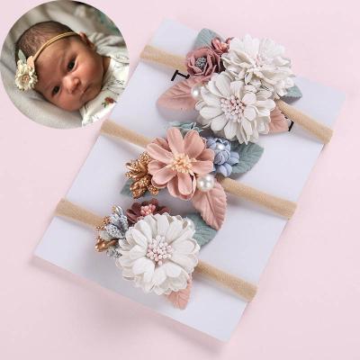 China 2020 Popular Newborn Girl Boy Headband Pearl Flower Baby Photography Props Princess Nylon Elastic Hairband Kids Floral Hair Accessories for sale