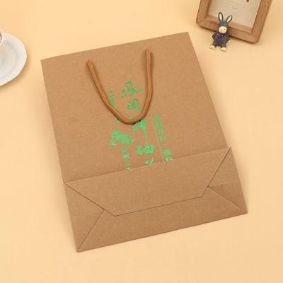 China Recyclable Luxury Customized Boutique Shopping Packaging Kraft Paper Christmas Gift Bag With Handle for sale