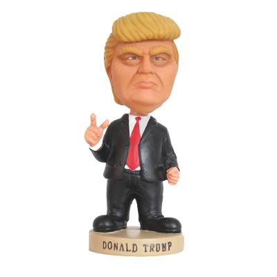 China Custom Europe Model Toy Style Donald Trump Flip Head Resin Bobblehead for sale