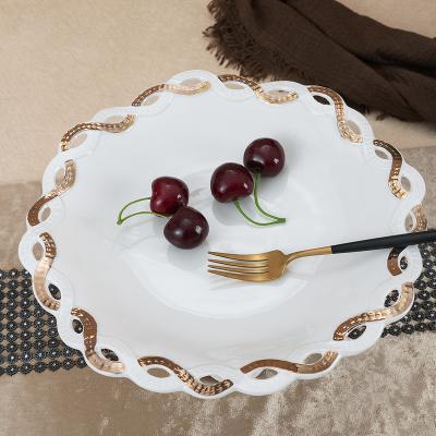 China Sustainable Amazon Hot Sale Ceramic Fruit Plate Home Hotel Decorative Ceramic Golden Fruit Tray for sale