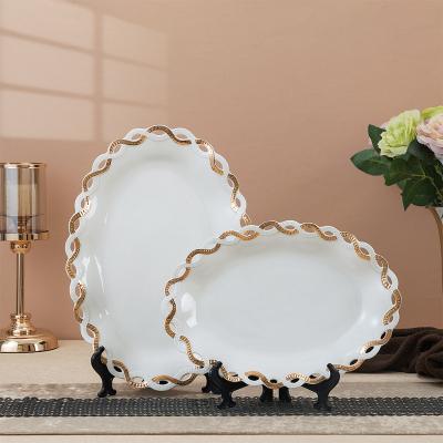 China Sustainable Hot Selling Oval Shape Porcelain White Gold Ceramic Fruit Plate For Restaurant Home And Hotel for sale