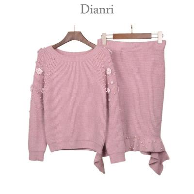 China Round neck anti-pilling lurex beading chime decoration pullovers woman sweater with irregular cut edge skirt suit sets for sale