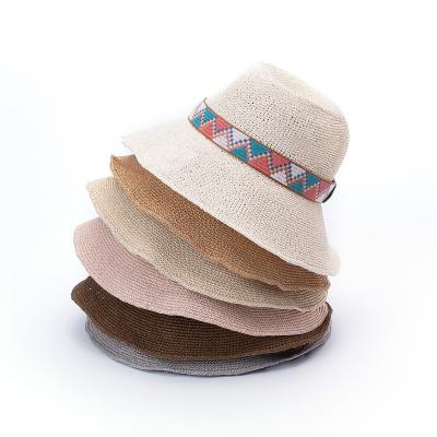 China Character Summer Crochet Paper Female Straw Hat With Fancy Decoration Band for sale