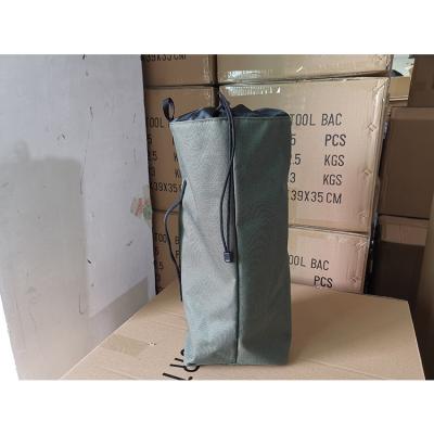 China Custom Large Capacity 600D Polyester Durable Green Mini Duffle Drawstring Bags With Logo Plastic for sale