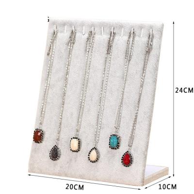 China Newest Display Large Capacity L-Type Flat Necklace Pilou Vertical Ear Studs Shelf Jewelry Rack for sale