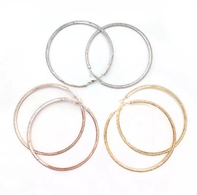 China Trendy yellowband metal circle earrings bright gold frosted circle girl earrings for sale