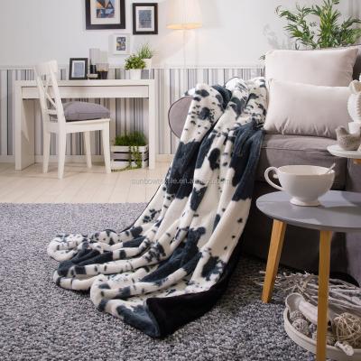 China Best Anti-pilling Fabbit Faux Fur Animal Throw Blanket Luxury Cow Print Blanket For Sofas for sale