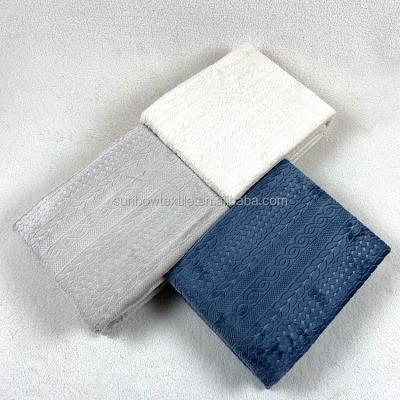 China Disposable Cable 3D Stripe Embossed Flannel Stock Ready To Ship Blanket Wholesale for sale