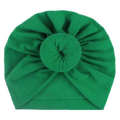 China European and American Wholesale Cotton Polyester Hats Newborn Infant Toddler Baby Style Beanie Hat with Tied Donuts for sale