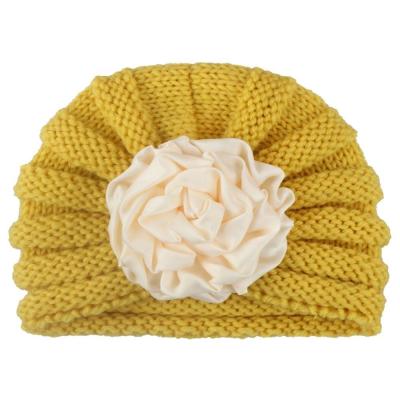 China Wholesale European and American style toddler baby knit hats polyester cotton winter newborn infant beanie with flowers for sale