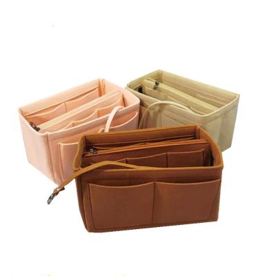 China Felt Fabric Insert Storage Bag Multi-pockets Fits In Handbag Toiletry Cosmetic Bags For Travel Makeup Storage Organizer for sale