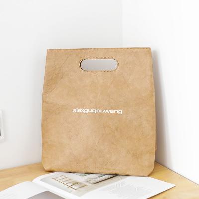 China 2020 Recyclable Fashionable Brown White Paper Bag Gift Bags For Men And Women for sale