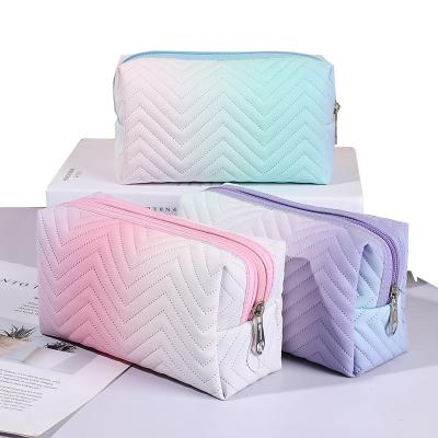 China 2022 new fashion women's PU leather gradient color cosmetic bag outdoor travel organize storage bag custom travel makeup bags for sale