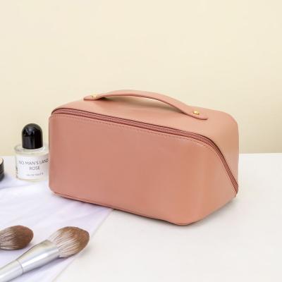 China Eco Wholesale Waterproof Vegan Cosmetic Bag Pouch Makeup Bag Reading Brush Makeup Towel Fashion Promotion Travel Leather Cosmetic Bag for sale