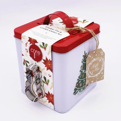 China Popular Recycled Materials Christmas Gift Package Tins With Handle For Candy Cookie for sale