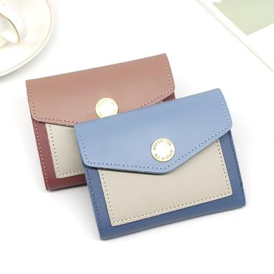 China Single Leather Triple Leather Women's Purse Fashion Coin Travel Short Wallet Card Holder For Lady for sale