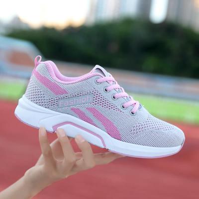 China DM Wholesale lightweight fashionable lightweight outsole flight knitted fabric sneakers walking style shoes for women for sale