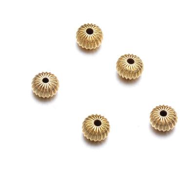 China Eco-friendly Separation Curved Stripe Loose Beads 18K Gold Plated Pumpkin Metal Beads Spacer For Jewelry Making Accessories Stopper Bead for sale