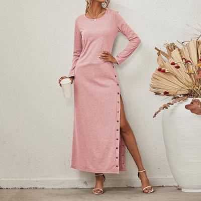 China Ladies Solid Color Breathable Sheath Long Irregular Round Neck Button Slit Dress for sale